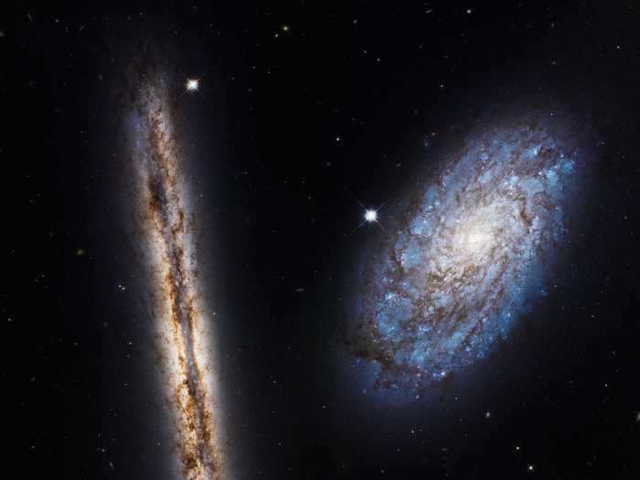 Both of these spiral galaxies are located 55 million light-years away from Earth in the Virgo Cluster.