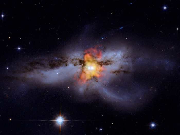 These two supermassive black holes began merging around 30 million years ago.