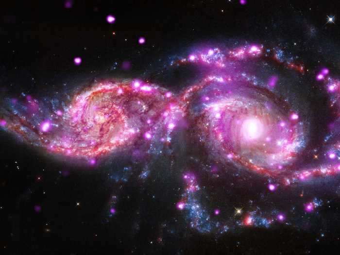 These merging spiral galaxies have been the site of three supernova explosions within the last 21 years.