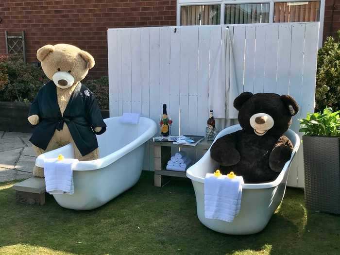 In Stockport, England, two teddy bears are bringing their neighbors joy with their antics.