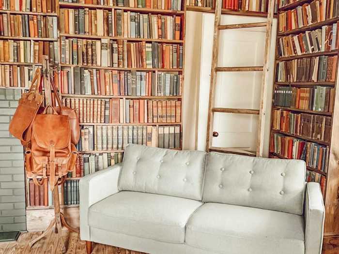 Floor-to-ceiling bookshelves instantly make a space feel cozy.