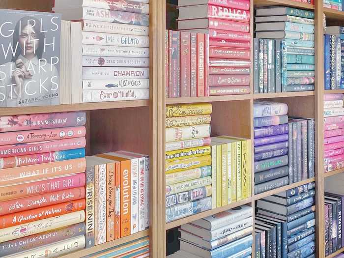 Color-coding and creative stacking create order in these bookcases.