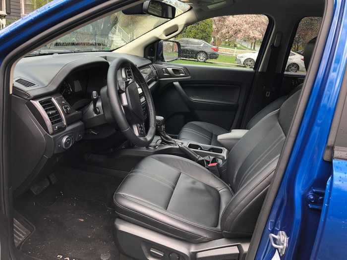 The interior of our tester was a no-nonsense "ebony," but the upholstery was leather. The front seats are heated.