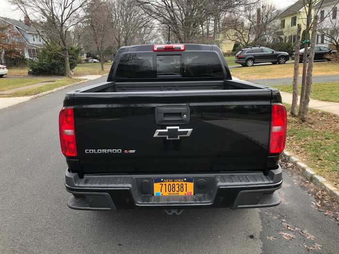 The blacked-out bowtie badge is replicated on the liftgate.