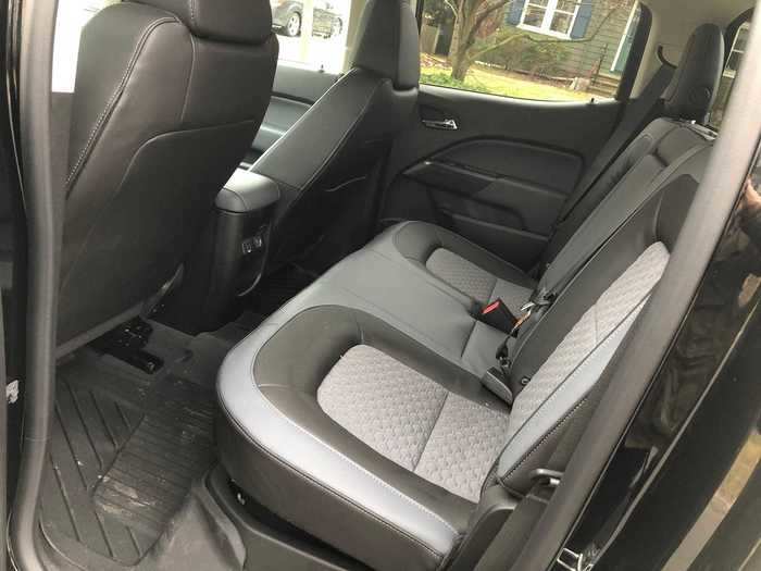 The rear seats in the "crew" configuration are a simple bench design. Adults can squeeze in, but we