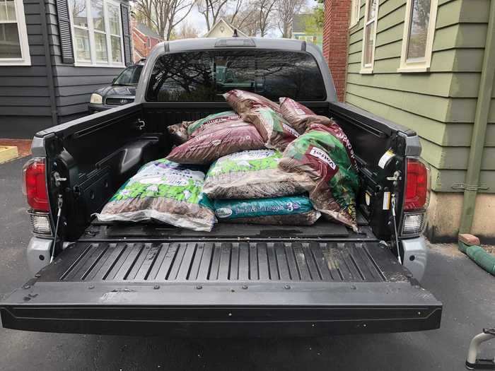 The bed swallowed up enough mulch and soil to repair my yard and garden from a brutal Northeastern winter.