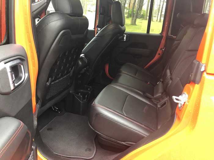 The back seats area bench design, and legroom is adequate, for a midsize pickup.