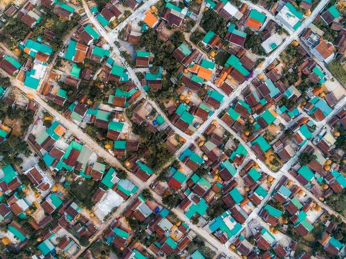 "The roofs in an old village" by Nông Thanh Toàn