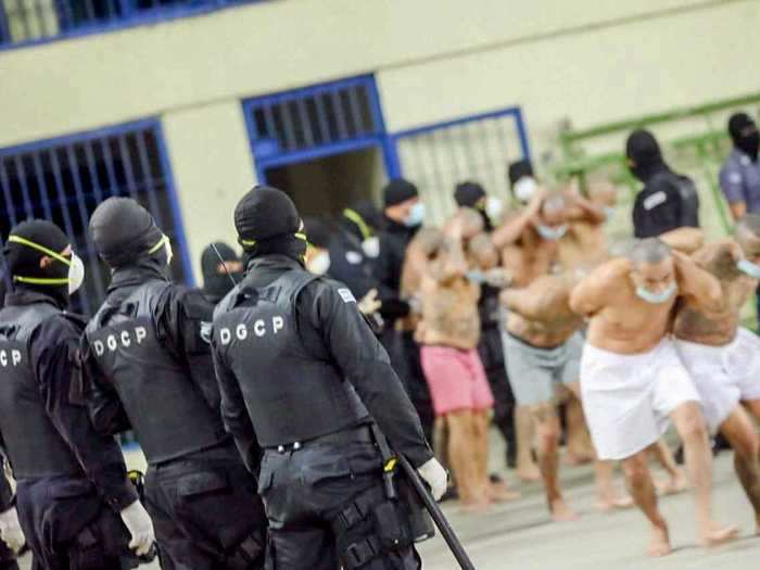 Prisoners were stripped of their clothes and dragged from their cells in Izalco jail so they could be checked for contraband.