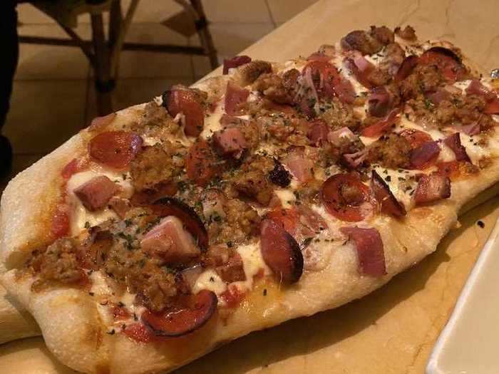 The molto meat flatbread pizza is a must for carnivores.