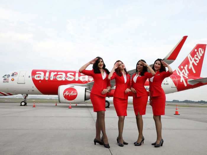 The uniforms are in stark contrast to the traditional AirAsia uniforms and will only be worn on rescue flights, according to CEO Tony Fernandes.