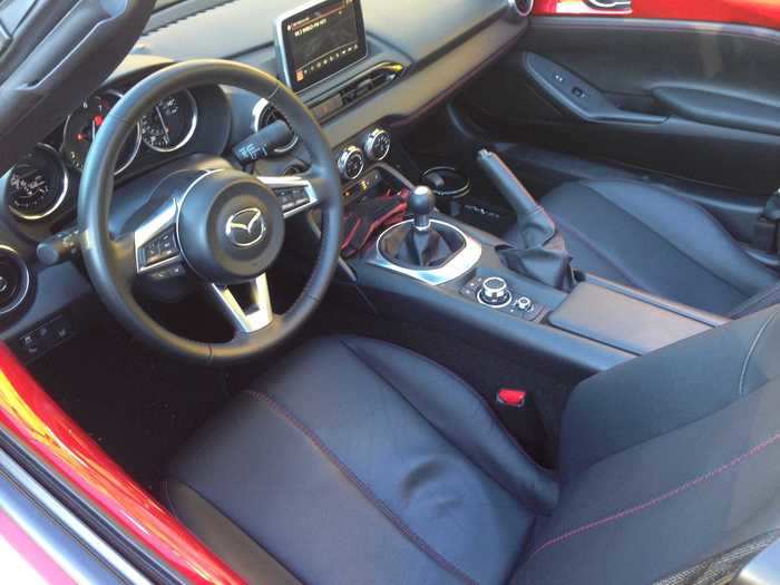 The interior has been steadily upgraded over the years, since the first Miata hit the road in 1989. The MX-5 has a 155-horsepower 2.0-liter inline four-cylinder engine, located right up front under the hood.