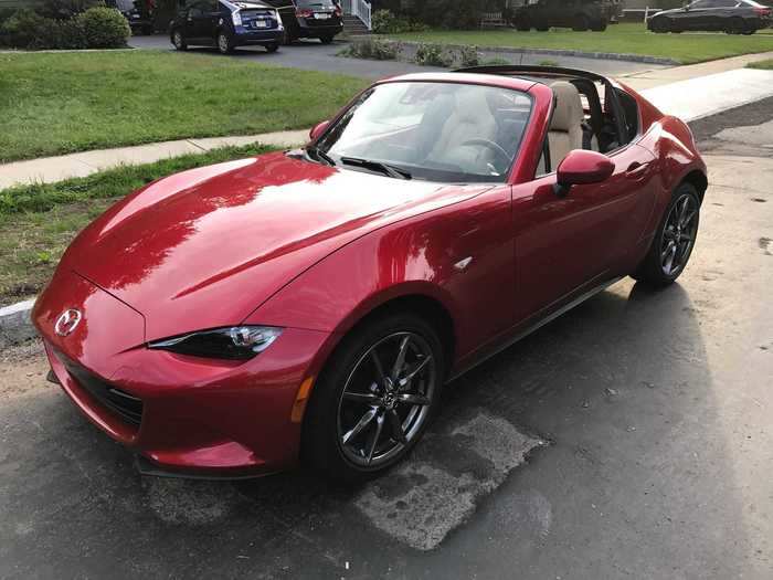 The big difference from the regular Miata is that the RF features a fastback coupe shape with an automated folding hardtop.