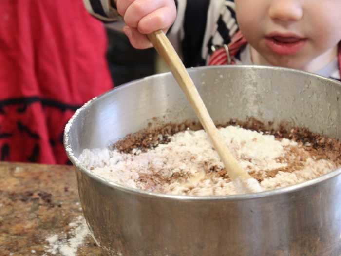 My nephew, who loves baking, helped combine the wet ingredients with the dry ones.