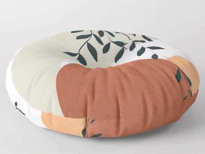 A pillow that adds to the decor by day and is a perfect seat for the kids at night