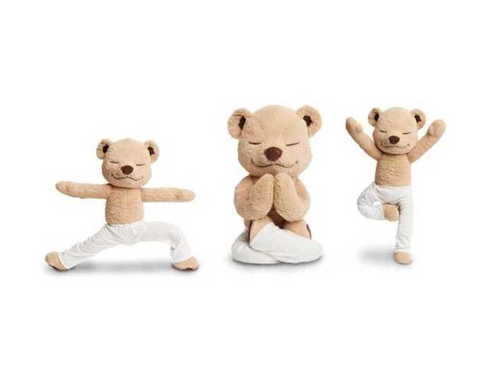 A teddy bear that demonstrates yoga poses for children