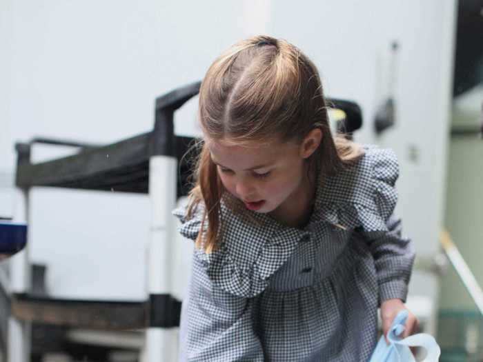 With an air of someone older than her years, the five-year-old seemed to be taking a lot of care with the food packages.