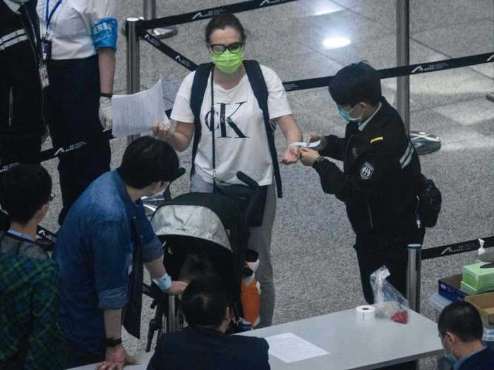 Bracelets became mandatory for arrivals in Hong Kong on March 18.