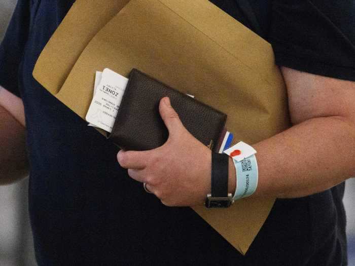 After two weeks, a text informs wearers that their quarantine period is over, and they can cut off the wristband.