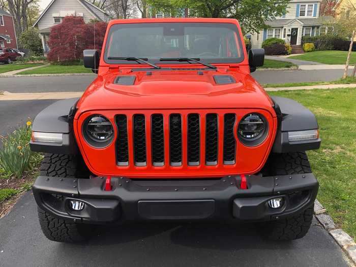 The familiar Jeep fascia has been updated, but it remains unmistakable, thanks to that famous slotted grille. The fenders are borrowed from the Wrangler, and they have built-in running lights. They