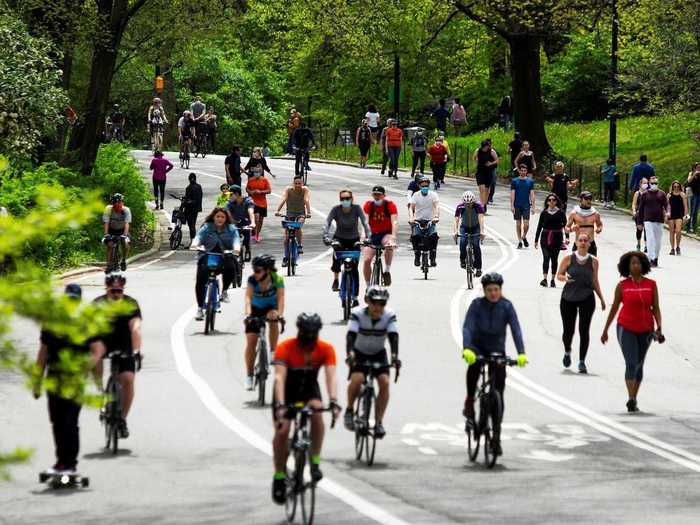 Thousands of people were sunbathing, doing exercise, walking their dogs, and even picnicking in and around Central Park.