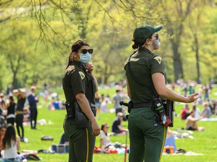 City officials were also aware that the warm weather would draw crowds, sending out 1,000 police officers to enforce social distancing measures and also give away free face masks.