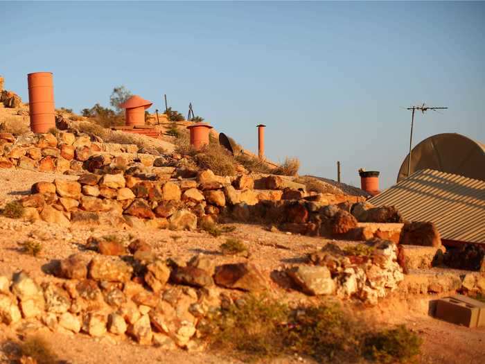 As opal mining settled into a steady — but less booming — business, Coober Pedy residents began turning discarded opal mines into permanent dugouts.
