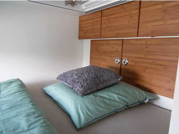 This primary sleeping space, which sits at the rear of the tiny home, is ventilated and heated.