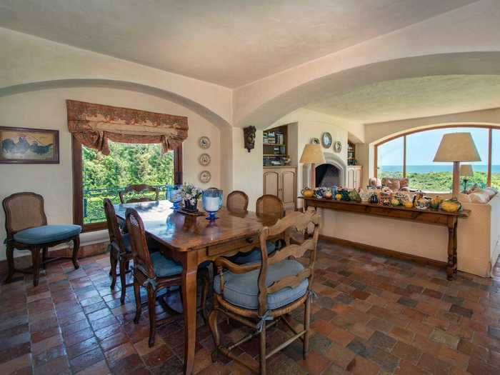 From the kitchen, the house opens up into a living room ...