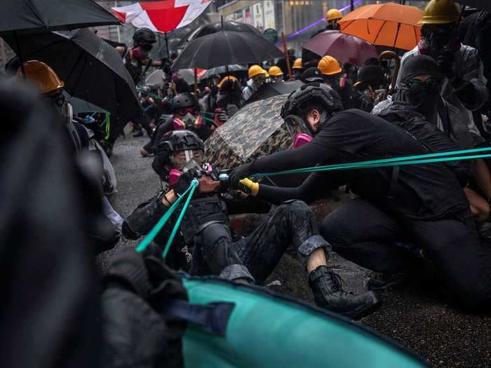 Organizers of the protests put forth five key demands: to completely withdrawal the extradition bill; to refrain from classifying the protests as riots; to release protestors who were unlawfully arrested; to investigate police brutality; to establish fair and free elections in the city.