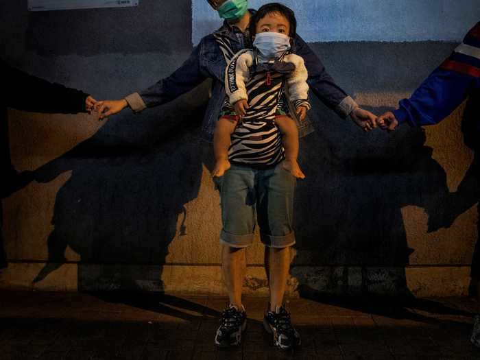 By the end of November, the university protests had subsided but demonstrators still gathered to stand in solidarity with one another in the pro-democracy battle for Hong Kong. "We can