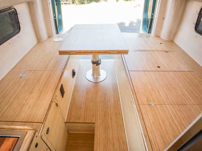 The customer wanted — and ultimately received — a full bathroom, kitchenette, fridge, freezer, bathtub, and a dining and sleeping area inside of the 144-inch van, Daniel Kuttner of MAD Vans said in the YouTube video tour of the build.