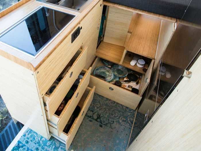 The lower drawer on the first step was built to store all of the cookware items, such as dishes and pans …