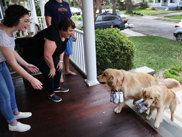 But the brew dogs bring customers across Huntington joy by running up to their porches and giving them an opportunity to play with a furry friend.