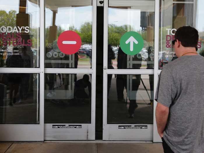 Signs at the entrance directed customer traffic to one side. Only two of the mall