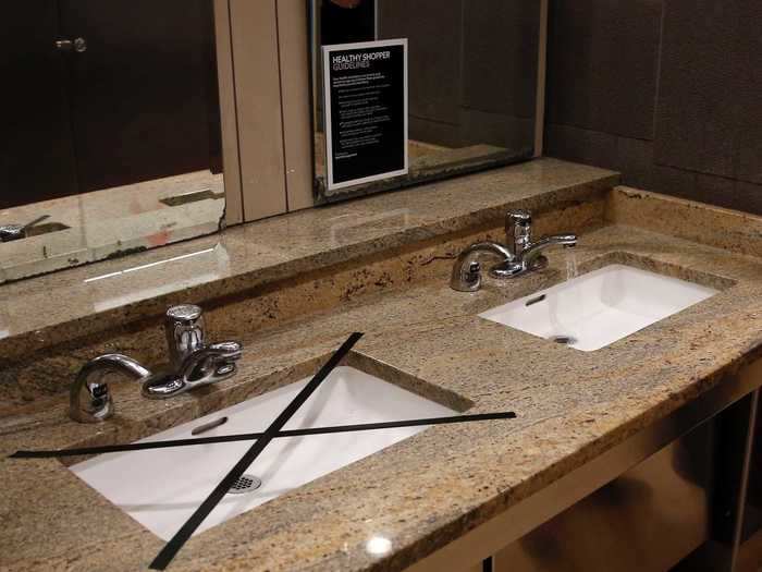 Mall operators blocked off certain sinks in restrooms to encourage social distancing. Only one of the mall