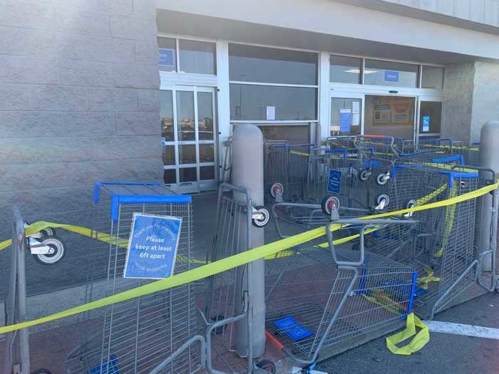 A Walmart in Chattanooga made efforts to keep shoppers away from one another, including blocking off the entrance to prevent crowding ...