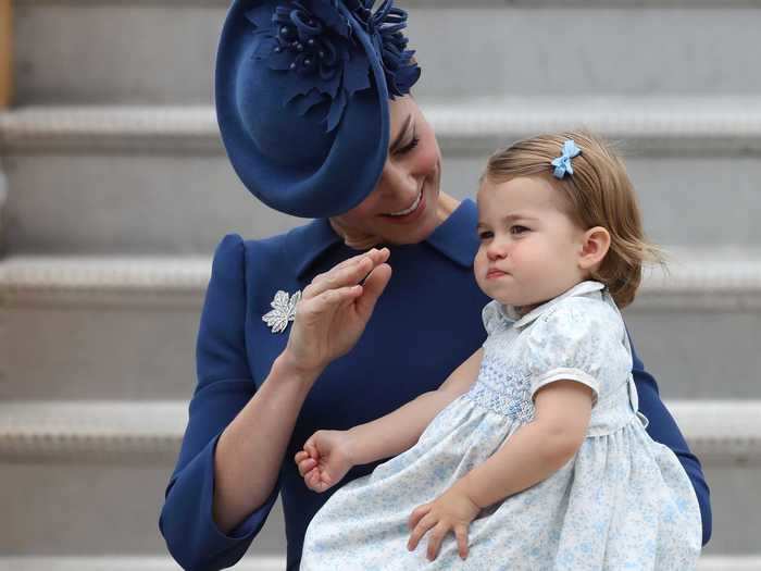 She taught Princess Charlotte how to do a royal wave.