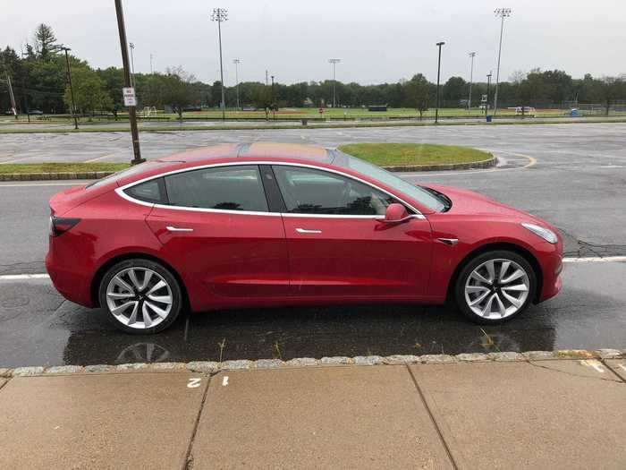 The Model 3 is a fastback sedan — the roofline terminates at the truck lid, and the car isn