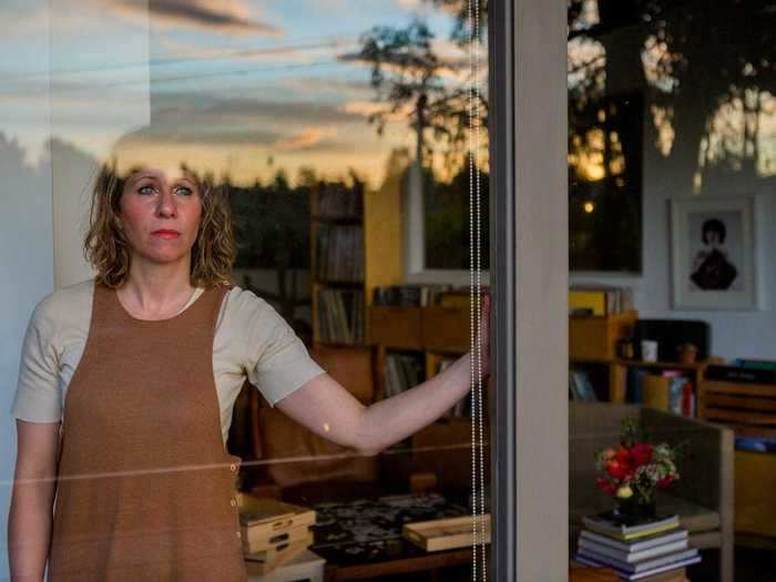 So she decided to practice photographing people through windows — which is difficult due to reflections — and started putting together a "quarantine portfolio" by shooting friends and neighbors.