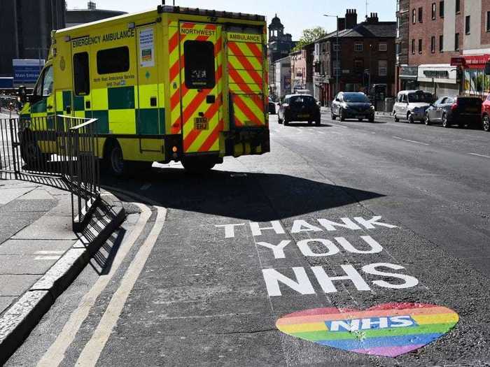 Outside of the Royal Liverpool Hospital, a message thanking National Health Service workers was painted on the road.