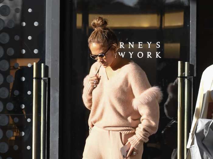 Jennifer Lopez made sweatpants chic when she paired hers with a fun sweater.