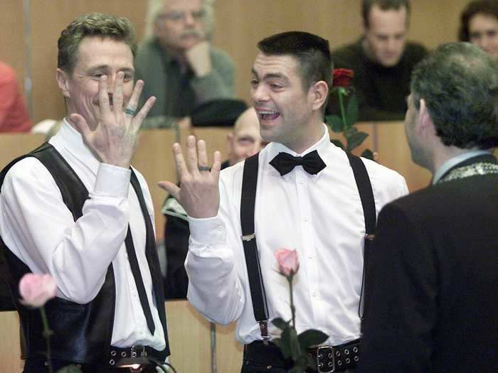 Peter Lemke and Frank Wittebrood — one of the four couples — looked delighted with their wedding rings. But there was a still long way to go with global attitudes toward gay marriage.