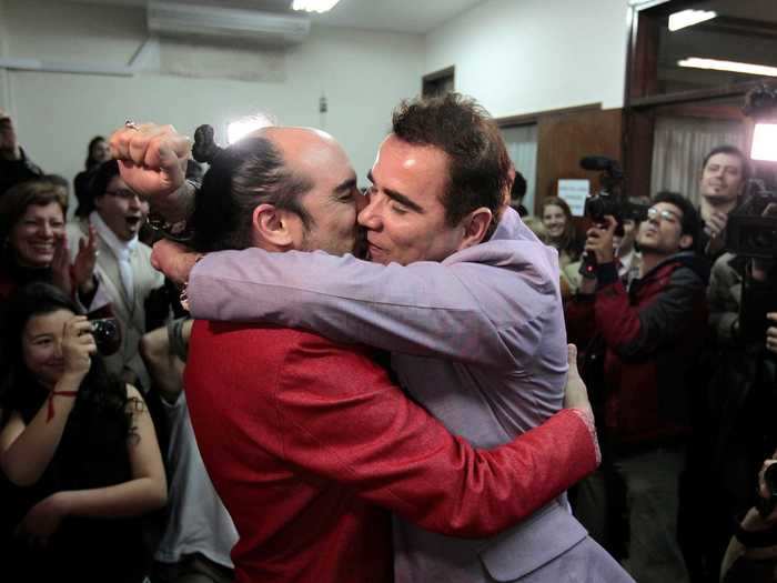 Around the same time, Sergio Miranda and Rodrigo Borda married in Uruguay, the second Latin American country to legalize gay marriage. Here they are embracing after their wedding at a civil registrar