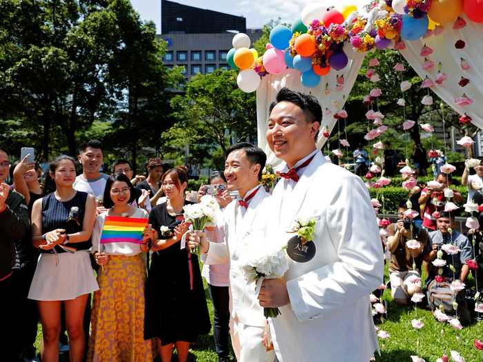 Over in Asia, Taiwan became the first country to make same-sex marriage legal on May 24, 2019. This couple registered their marriage on that very day, and celebrated with a rainbow-colored party.