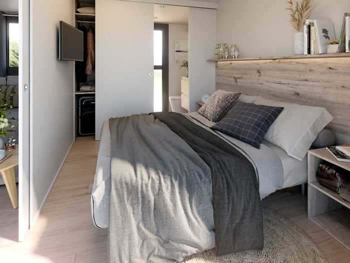 There are three bedrooms and two bathrooms that are separated from the open-concept living room and kitchen with sliding doors. Along with the bed and bed frame, the rooms — which can each sleep two — also come with a nightstand and cabinets for storage.