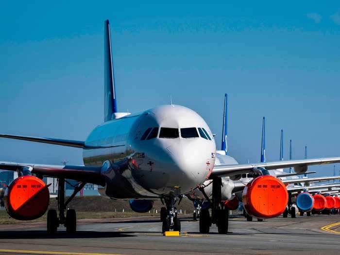 Runways, taxiways, and empty tarmac spaces have been filled with grounded airliners where they