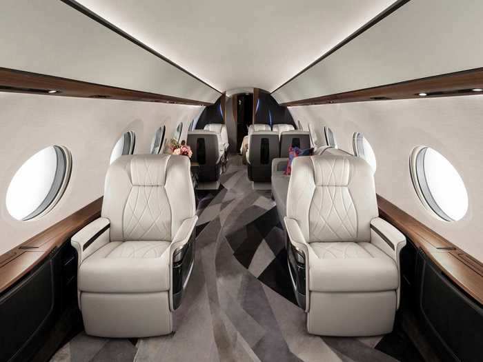 One configuration includes five living compartments starting with four pairs of club seats in the front of the aircraft facing each other, with each pair having its own table retractable from the cabin wall.