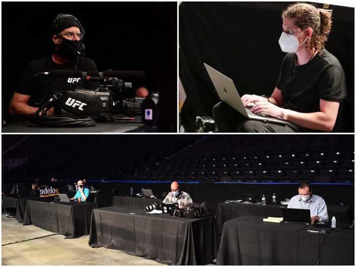 A cameraman, photographer on her computer, and media members socially-distant on separate tables were seen wearing masks behind-the-scenes.