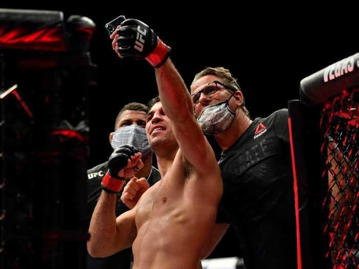 The only thing left to do after each fight was finished, was for the winner to commemorate the bout with a selfie, like Vicente Luque did with his two masked cornermen here after destroying Niko Price